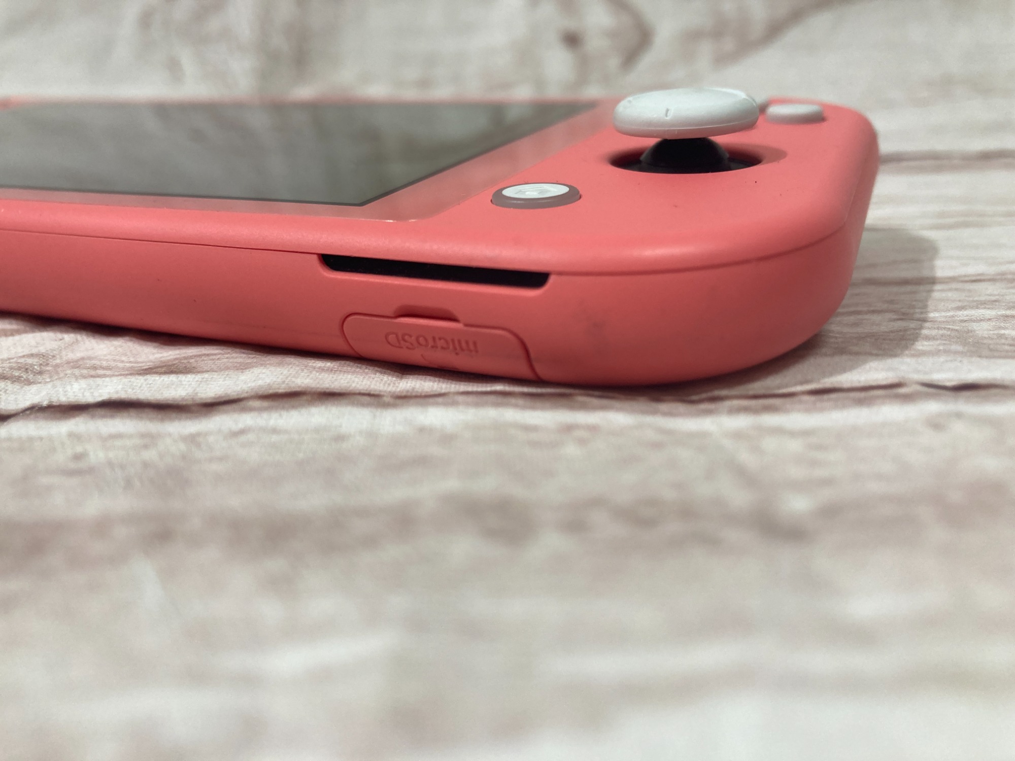 Nintendo Switch Lite (任天堂スイッチライト) コーラル を買取入荷