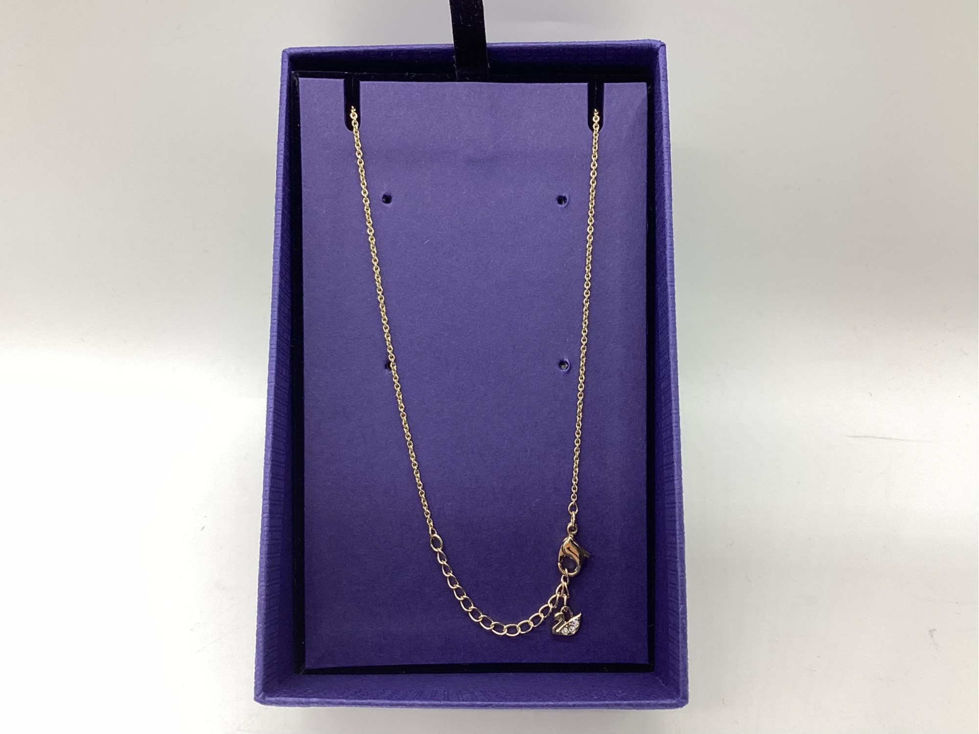 SWAROVSKI】鍵、ハートモチーフのゴールドネックレスのご紹介