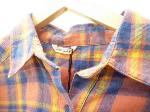 レディースファッションのシャツ