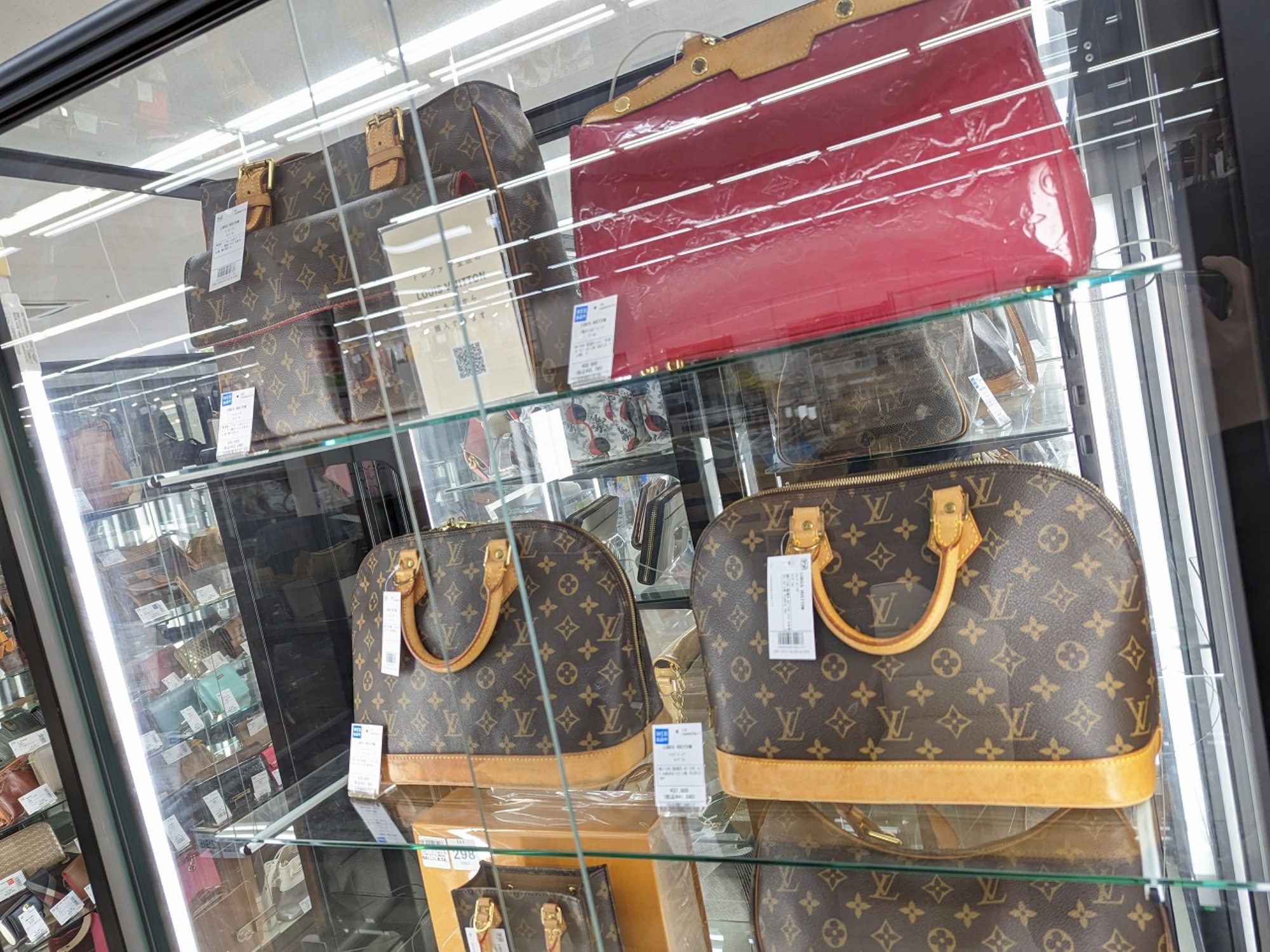 Louis Vuitton (ルイヴィトン)】コインケース タイガ ジッピー・コイン 
